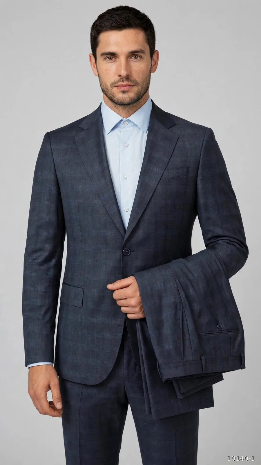 Model wearing a navy check wool suit