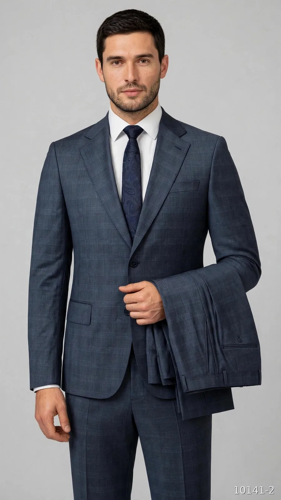 Model wearing a slate check wool suit